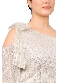 An off-the-shoulder neckline with cutouts defines this shimmery sequined bow-embellished blouse from CeCe. | CeCe Women's Plus Size Cold Shoulder Bow Sequin Blouse, Champagne, 2X Glamorous Shimmer Blouse For Spring, Glamorous Summer Shimmer Blouse, Summer Party Blouse With Cold Shoulder, Fall Party Blouse With Cold Shoulder, Summer Party Cold Shoulder Blouse, Fall Party Cold Shoulder Blouse, Fitted Cold Shoulder Blouse For Party, Summer Formal Sequin Blouse, Formal Summer Sequin Blouse