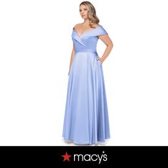 a woman in a blue dress with her hands on her hips and the words macy's