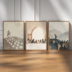 three framed pictures with people and sheep on them in front of a white wall,