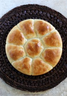 a hot cross bun sitting on top of a brown plate