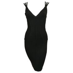 Jet-black knit dress with corseted waist and unique triple straps designed by Azzedine Alaia exactly as seen on the spring 1990 runway. Size XS. Approximate measurements (unstretched): bust 30", waist 24, hips 32" and length 36.5". Fabric content: 85% cotton and 15% elastane. Made in Italy. Very good condition. Black Runway Dress, Black Runway, Azzedine Alaia, Black Knit Dress, Runway Dresses, Black Knit, Old Hollywood, Knit Dress, Evening Dresses