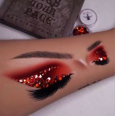 Red Diamond Eye Makeup, Red Silver Makeup Looks, Red Christmas Eyeshadow, Red Makeup With Rhinestones, Glam Red Makeup, Red Cut Crease Eyeshadow, Red Fairy Makeup, Red And Gold Makeup Looks, Red And Silver Makeup