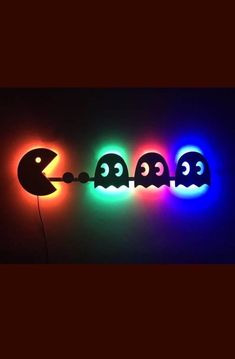 three lights that have been turned on to look like pacman and the other two are glowing