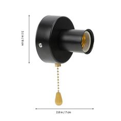 an image of a black wall light with a gold bulb on the side and a white background