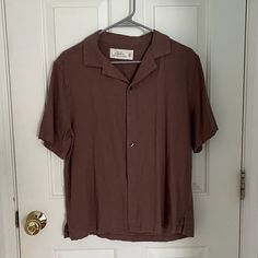 Brown Short Sleeve Button Up Shirt Great Condition Never Worn Brown Button-up Tops With Placket, Brown Spread Collar Top With Button Closure, Brown Relaxed Fit Top With Placket, Relaxed Fit Tops With Buttons And Spread Collar, Relaxed Fit Tops With Spread Collar And Buttons, Classic Brown Tops With Johnny Collar, Classic Brown Top With Johnny Collar, Brown Spread Collar Tops With Buttons, Casual Brown Tops With Button Closure