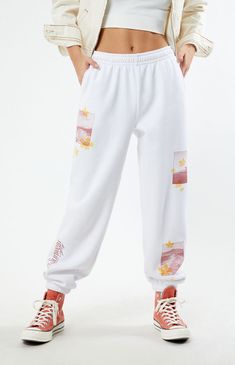 Sit back and relax all season long in the cute and comfy Pacific Sunwear Beach Sweatpants from PacSun. These high-waisted sweatpants feature an interior drawstring waistband for a customizable fit and Pacific Suwnear beach graphics. 


	Solid color sweatpants
	11.625" rise
	29.25" inseam
	High-rise
	Interior drawstring waistband
	Side hand pockets
	PacSun graphic
	Elastic ankle cuffs
	60% cotton, 40% polyester
	Machine washable
	Model is wearing a size small
	Model measurements: 5’7” height, 32.5” bust, 25.5” waist, 36” hip Beach Graphics, High Waisted Sweatpants, Pacific Sunwear, Sweat Set, Ankle Cuffs, Personal Marketing, Drawstring Waistband, Exclusive Collection, Model Measurements