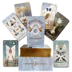 several cards are stacked on top of each other in front of a white background with angel images