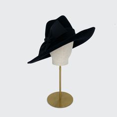 The black velour felt sidesweep fedora from the Rachel Trevor Morgan collection is suitable for everyday wear and special occasions such as horse racing events. Rachel Trevor Morgan, The Rachel, Saint James, Horse Racing, Fedora, The Black, Everyday Wear, Special Occasion, Felt