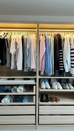 an organized closet with clothes and shoes