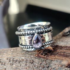 Welcome in SilverArtisanRingDescription Metal :- 925 Sterling SilverStyle :- Spinner Ring++++++++++++++++++++++++++++++++++++++++++++Benefit of Amethyst Stone:- =  Amethyst helps in improving communication and self expression of people. ...=    Purple is a very calming color and is also the color for throat chakra so people wear it around neck. =   It helps in providing inner peace, mental stability and balances the Thyroid gland.++++++++++++++++++++++++++++++++++++++++++++Occasion : Birthday Ev Silver Ring Wedding, Mental Stability, Woman Ring, Thyroid Gland, Self Expression, Amethyst Gem, Purple Band, Spinner Ring, Throat Chakra