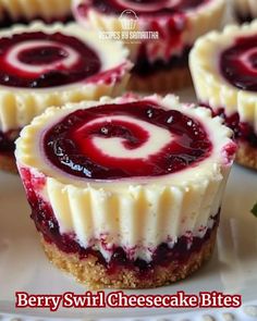 berry swirl cheesecake bites on a white plate