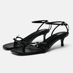 Zara Heeled Leather Sandals. Front Straps With Buckles And Toe-Post. Buckled Ankle Strap Closure. Squared Toes. Heel Height: 2.4 Inches (6 Cm) Airfit. Flexible Technical Sole Made Of Latex Foam Designed To Offer Increased Comfort. Color: Black / Silver Size: Eur 39 Or Us 8 Zara Evening Sandals With Single Toe Strap, Zara Sandals With Single Toe Strap For Evening, Zara Formal Sandals With Low Heel, Zara Low Heel Party Sandals, Zara Leather Sandals For Night Out, Zara Leather Sandals For Party, Elegant Zara Sandals With Buckle Closure, Chic Party Heels With Silver-tone Hardware, Chic Heels With Silver-tone Hardware And Ankle Strap