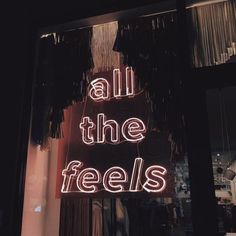 a neon sign that reads all the feels