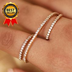 Two Finger Ring, Dual Finger Helix Ring, Double Finger Ring, High Quality CZ Ring, Sterling Silver CZ Ring, 14K Gold Plated Ring ✦ PRODUCT DETAILS ✣ Product Weight:--------4.70 Grams (Approx) ✣ Metal:----------------------925 Sterling Silver Gold Plated ✣ Finish:----------------------Silver / Gold / Rose Gold ✣ Stone:---------------------Cubic zirconia ✣ Stone Shape:------------Round ✣ Ring Size:-----------------All Size Available ✣ Ring Length:-------------26.50mm NOTE:- The pattern and color of the stone may vary slightly from reality. But you will receive the same product as shown in the photo. ✦ THIS PRODUCT CAN BE GIFTED ON THE FOLLOWING OCCASIONS Christmas Gift, Valentine Day Gift, Birthday Gift, Anniversary Gift, Wedding Gift, Mother Day Gift, Baby Shower Gift, Bridal Shower Gift, G Two Finger Ring, Helix Ring, Double Finger Ring, Gold Finger Rings, Friendship Day Gifts, Bespoke Rings, Finger Rings, Cz Ring, Plated Ring