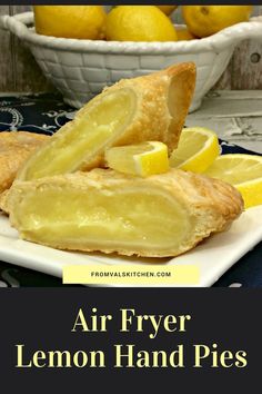 lemon hand pies on a white plate with bowl of lemons in the background