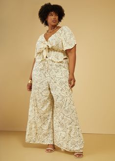 Raise your hand if you're ready for summertime! If you're like us & ready to be outside, grab these floral print gauze pants designed with flirty flounce that moves to your groove! Crop Top Plus Size, Non-stretch Floral Print Bottoms For Loungewear, Floral Print Wide-leg Lounge Pants, Summer Floral Print Wide-leg Harem Pants, Floral Print Wide-leg Loungewear Pants, Floral Print Full-length Loungewear Pants, Set Plus Size, Plus Size Crop Tops, Gauze Pants