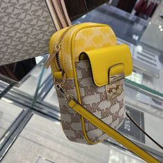 Brand New With Tag Michael Kors Sloan Editor Small Phone Logo Jacquard Crossbody Color: Butter Multi Logo Jacquard 78.5% Cotton/21.5% Polyester Trim 1: 60% Polyurethane/20% Cotton/20% Polyester Gold-Tone Hardware 7”H X 4.5”W X 2” D Adjustable Strap: 15.75”-25” Exterior Details: Back Slip Pockets, Front Pocket Interior Details: 3 Cc Slip Pockets Lining: 100% Polyester Imported Luxury Yellow Shoulder Bag With Zipper Closure, Yellow Michael Kors Travel Bag, Michael Kors Yellow Travel Shoulder Bag, Michael Kors Yellow Shoulder Bag For Travel, Michael Kors Yellow Rectangular Shoulder Bag, Small Phone, Phone Logo, Large Crossbody Bags, Michael Kors Crossbody Bag