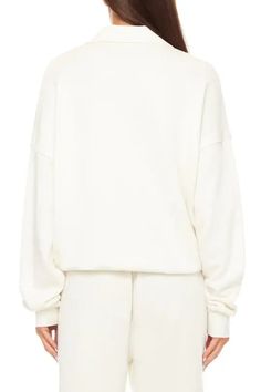 Cut from a butter soft cotton French terry, Eterne's oversized polo sweatshirt is a modern take on a vintage favorite. This sweatshirt features a relaxed, oversized body with polo detail. Oversized Hoodie With Ribbed Cuffs For Lounging, Relaxed Sweatshirt For Fall Leisure, Oversized Athleisure Sweatshirt For Leisure, Oversized Athleisure Sweatshirt For Lounge, Oversized Athleisure Sweatshirt For Lounging, Oversized Sweater With Ribbed Neckline In French Terry, Oversized Sweatshirt With Ribbed Collar And Drop Shoulder, Sporty Drop Shoulder Sweatshirt For Loungewear, Oversized Soft Texture Hoodie For Loungewear