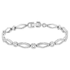 Dress her wrist in luxury with this enticing vintage-inspired diamond bracelet. Crafted in cool weaves of .925 sterling silver, this shimmering design features alternating circle and kite-shaped links that sparkle with diamonds and are lined with intricate milgrain detail. Captivating with 1-1/2 cts. t.w. of diamonds and a brilliant buffed luster, this 7.0-inch bracelet secures with a tongue and groove clasp. Product features: Diamond Type: Natural White Diamonds Diamond Count: 338 Round-Cut Dia Diamond Settings, Tongue And Groove, Bracelet Clasps, 2 Carat, White Diamonds, Diamond Clarity, Round Cut Diamond, Link Bracelets, Sterling Silver Bracelets