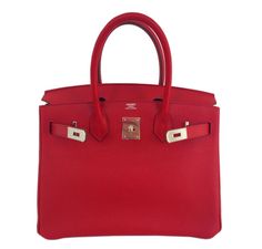 Bag: Hermes Birkin Bag Size: 30cmColor: Rouge GaranceMaterial: Togo Leather Hardware: PalladiumMeasures: 30x21x15cm (12"x8.5"x6")Condition: Pristine Includes: Lock, Keys, Clochette, Sleeper, Raincoat, Hermes Box This Hermes Birkin 30cm bag is featured in the Rouge Garance color, which is a very bright red with raspberry pink undertones. This bag is made from smooth togo leather and is accentuated by palladium hardware. This store-fresh Hermes Birkin bag has never been carried and comes with all of the original accessories. Note: Our Items are totally New High quality Brand Inspired Refurbished. Please make sure you are well aware of it before buying any of the Item. T&C's Apply in case of refunds. Please send us message on below chat to confirm availability. We will send the Refurbished Mo Birkin 30, Hermes Birkin 30, Hermes Box, Togo Leather, Raspberry Pink, Gold Ounce, Hermes Birkin, Birkin Bag, Bright Red