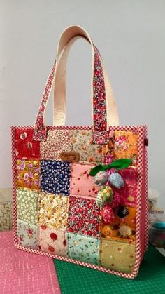 a handbag made out of patchwork fabric