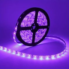 purple led strip light on white background