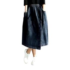 Elevate your look this Spring-Summer season with our Unequal Denim Skirt ââ‚?a timeless piece that unites the classic 90s vibe with modern. rubber closure features!Distinctive Features: Vintage-Inspired Aesthetic: Crafted with a 90s-inspired stonewashed pattern. this skirt is the perfect blend of nostalgia and contemporary fashion. A-Line Silhouette: Its A-line silhouette and high-waist fit provide a flattering shape. perfect for any body type. Functional Rubber Closure: Its rubber closure ensur