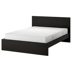 a black bed frame with a white mattress