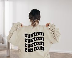 Custom Sweatshirt, Personalized Sweater, Customized Wavy Text Shirt, Custom Unisex Hoodies, Back Print Sweater, Trendy Woman Shirt Welcome to my BEB Tee Design store!  In my shop, you will find high quality Bella Canvas Brand T-Shirt. My shirts are soft and regular relax fit.  Hey! Don't forget to see the drop-down menus for the sizes and colors that you would like to order.  And it is so important to check the size charts in the listings.  These are the information below about my products and s Custom Text Long Sleeve Tops For Streetwear, Customizable Cotton Hoodie Tops, Casual Long Sleeve Tops With Custom Text, Custom Text Long Sleeve Sweatshirt For Streetwear, Customizable Long Sleeve Sweatshirt, Casual Cotton Hoodie With Custom Text, Custom Text Relaxed Fit Long Sleeve Sweatshirt, Custom Text Long Sleeve Relaxed Fit Sweatshirt, Casual Crew Neck Hoodie With Custom Text