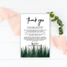 a thank card with the words, thank you on it and trees in the background