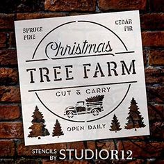 a sign on the side of a brick wall that says christmas tree farm cut and carry