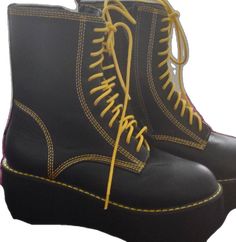 Black Lace-up Combat Boots For Spring, Black Ankle-high Martin Boots For Spring, Yellow Lace-up Platform Boots, Black Platform Martin Boots For Spring, Black Ankle-high Platform Boots For Spring, Black Lace-up Martin Boots For Spring, Black High-top Lace-up Boots For Spring, Black Martin Boots For Spring, Black Martin Boots With Round Toe For Spring