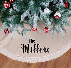 a christmas tree skirt that says the millers on it