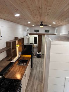 the kitchen is clean and ready to be used as a living room or dining area