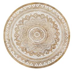 a round rug with an intricate design on it