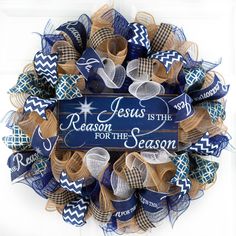 a wreath that says jesus is the reason for the season