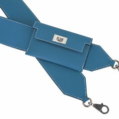 Guaranteed authentic Hermes Kelly Pocket Bag Strap featured in Blue Jean.Yes, it is back! Iconic beloved Hermes Bleu Jean.The strap has a card holder with a Kelly turn key clasp.Fresh with Palladium hardware. Strap is Swift leather and card case is Epsom leather.Comes with sleeper and signature Hermes box.New or Pristine Store Fresh Condition.final saleSTRAP MEASURES:36" X 2"CONDITION:New or Pristine Store Fresh Condition Luxury Bags With Key Leash, Luxury Bag Strap With Removable Pouch For Daily Use, Blue Epsom Leather Rectangular Bag, Blue Rectangular Epsom Leather Bag, Rectangular Blue Epsom Leather Bag, Luxury Rectangular Bag Strap With Removable Pouch, Luxury Bags With Key Leash For Everyday Use, Luxury Bag Strap With Detachable Handle For Travel, Luxury Detachable Bag Strap For Travel