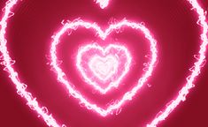 a neon heart shaped object in the middle of a red background with white swirls