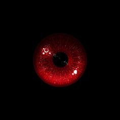 an eyeball is shown in the dark