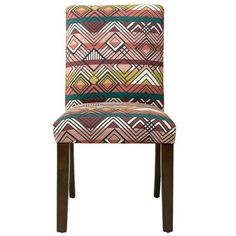 an upholstered chair with geometric patterns on it