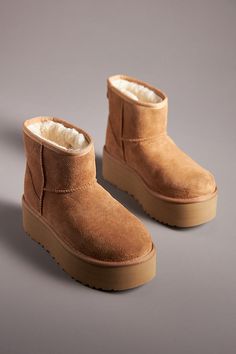 * Suede upper* Sheepskin wool insole* Rubber sole* Pull-on styling* Imported Ugg Boots Aesthetic, Ugg Classic Mini Platform, Anthropologie Gifts, Mini Uggs, Ugg Boot, Classic Ugg Boots, Xmas Wishes, Ugg Mini, Ugg Classic Mini