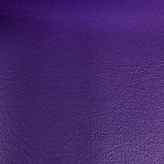 a purple leather texture background or wallpaper that looks like it has been painted in different shades