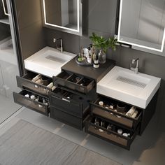 a bathroom vanity with two sinks and several drawers in front of the mirror is shown