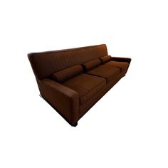 a brown couch sitting on top of a white floor