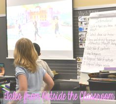 two children in front of a projector screen with the words tales from inside the classroom