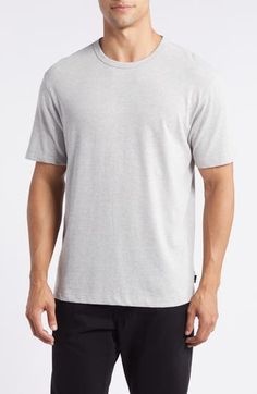 Lightweight and versatile, this burnout-inspired T-shirt made with cotton and viscose makes a great choice for layering and always looks great on its own. Crewneck Short sleeves 50% polyester, 38% cotton, 12% viscose Machine wash, tumble dry Imported Summer Layering Crew Neck T-shirt, Cotton Scoop Neck T-shirt For Layering, Cotton Scoop Neck Layering T-shirt, Looks Great, Heather Grey, Heathers, Layering, Tee Shirts, Short Sleeves