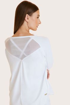 One of our favorite pieces in the line, this boyfriend fit long sleeve tee with a back mesh accent is so cozy you’ll never want to take it off. Crew neck long sleeve tee Mesh detail at back Loose throughout body White Stretch Top With Mesh Back, White Long Sleeve Tops With Sheer Sleeves, White Casual Mesh Top With Mesh Sleeves, White Long Sleeve Top With Sheer Sleeves, Casual White Mesh Top With Mesh Sleeves, White Sheer Sleeve Tops For Fall, White Casual Top With Mesh Sleeves, Casual White Tops With Mesh Sleeves, Sporty Tops With Mesh Sleeves For Spring