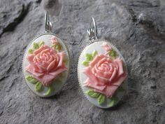 "Beautiful rose cameo french earrings. I have these in several colors or choose your own from one of my many rose cameos, so please do browse. Also please see the matching necklace for the complete look. Perfect gifts. Timeless classic look, both casual and formal. The cameo is set in a stunning and quite sturdy silver plated, rose gold plated, gold plated or bronze french earrings, and as always lead and nickel free. They each measure about 1\" Quite a beautiful year round look, both casual and Oval Rose Design Jewelry For Wedding, Wedding Rose Earrings, Victorian Pink Earrings For Wedding, Victorian Style Pink Earrings For Wedding, Handmade Rose Flower Earrings For Wedding, Handmade Rose Earrings For Wedding, Flower-shaped Rose Earrings For Weddings, Wedding Earrings With Rose Details, Wedding Flower Earrings With Rose Details