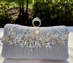 Fabulous design with a glittering touch.  Perfect finishing touch for any formal outfit.  Ideal for cocktail party or wedding.  Can be made in silver, gold or black.  Purse measures 7.5 x 4.8 inches Elegant Evening Bag With Bling For Parties, Elegant Bling Evening Bag For Parties, Elegant Sparkling Clutch For Formal Occasions, Elegant Clutch With Bling For Events, Elegant Event Clutch With Bling, Elegant Sparkling Evening Bag For Events, Elegant Sparkling Evening Bag, Elegant Bling Clutch For Events, Sparkling Clutch Evening Bag For Wedding