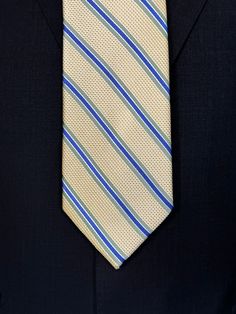 A general all around great tie to wear with any suit, shirt for any occasion. With two different types of silk in the same necktie, the stripe being satin and the broad section being woven, this tie makes an all day knot that does not have to be readjusted. With colorations of kelly green and blue stripes, you cannot make a mistake creating a look with this tie pairing with any suit in your closet. Classic Striped Ties For Business, Classic Black Tie With Vertical Stripes, Classic Suit And Tie Accessories With Vertical Stripes, Classic Vertical Stripes Tie For Black Tie Events, Classic Ties With Vertical Stripes For Black Tie Events, Classic Vertical Stripes Ties For Black Tie Occasions, Pinstripe Business Tie, Classic Vertical Striped Tie, Classic Tie With Vertical Stripes